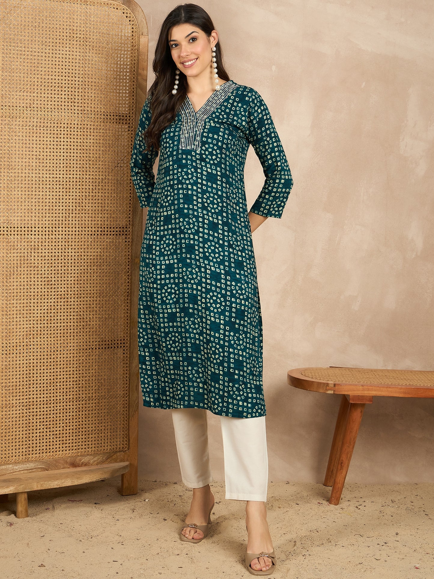 WOMEN VISCOSE RAYON STRAIGHT KURTI EMBLISHED WITH HAND WORK ON V-NECKILINE YOKE