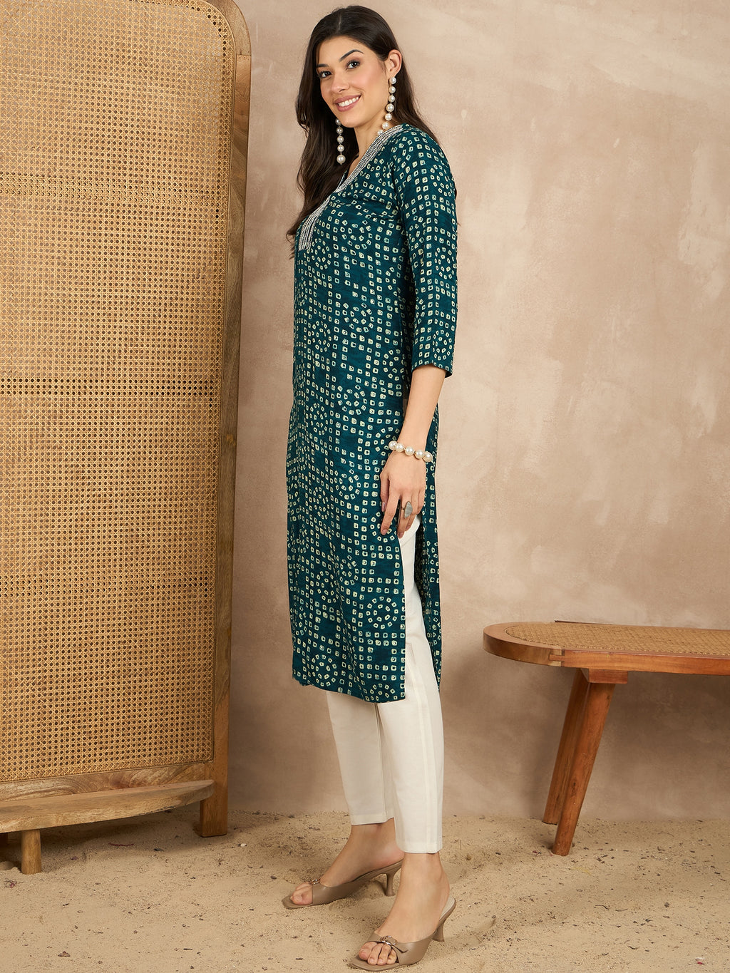 WOMEN VISCOSE RAYON STRAIGHT KURTI EMBLISHED WITH HAND WORK ON V-NECKILINE YOKE