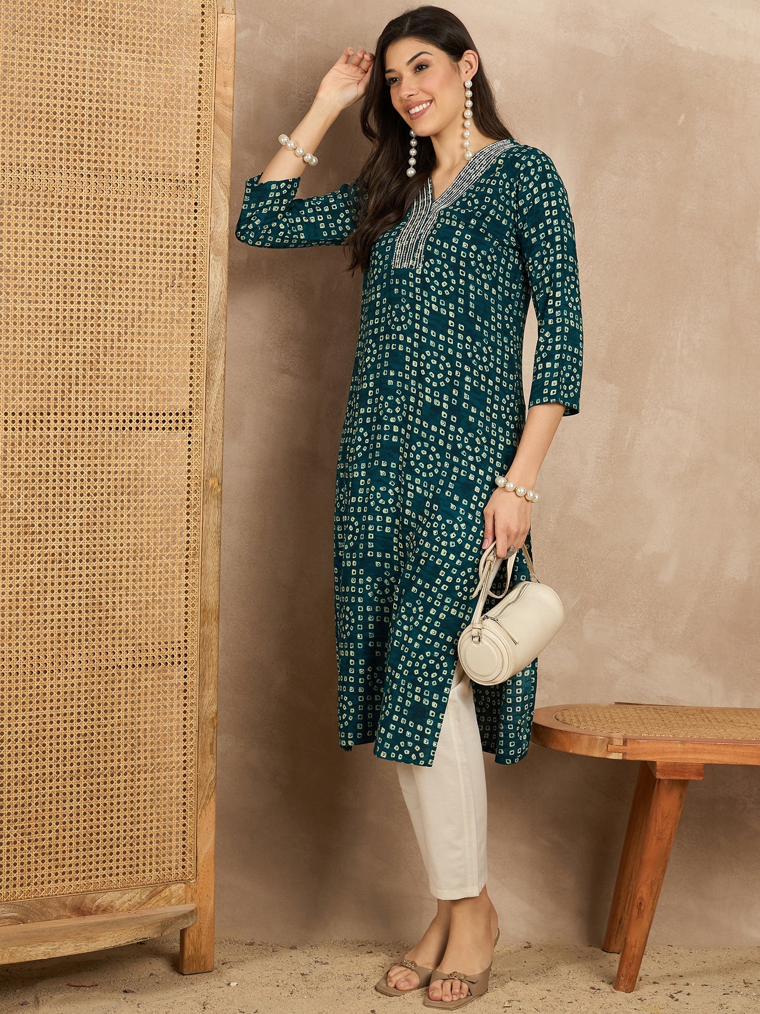 WOMEN VISCOSE RAYON STRAIGHT KURTI EMBLISHED WITH HAND WORK ON V-NECKILINE YOKE