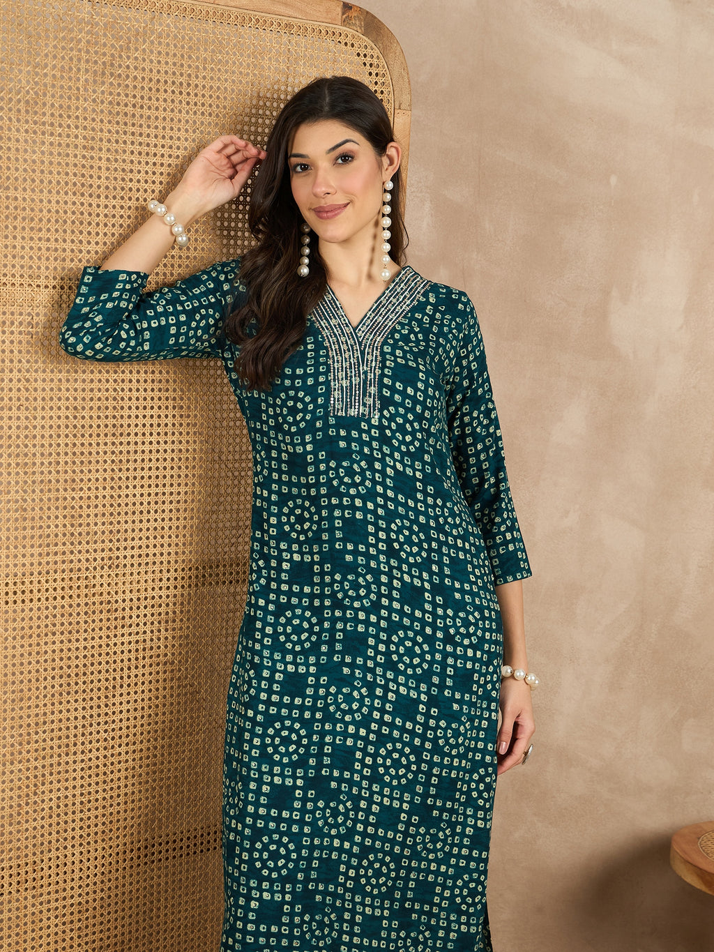 WOMEN VISCOSE RAYON STRAIGHT KURTI EMBLISHED WITH HAND WORK ON V-NECKILINE YOKE