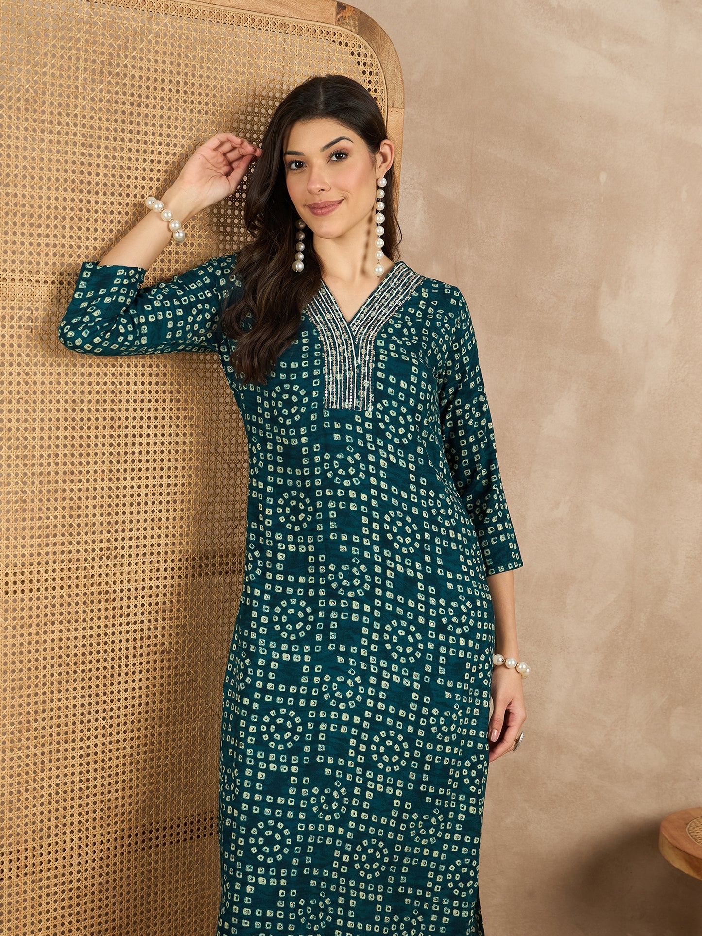 WOMEN VISCOSE RAYON STRAIGHT KURTI EMBLISHED WITH HAND WORK ON V-NECKILINE YOKE