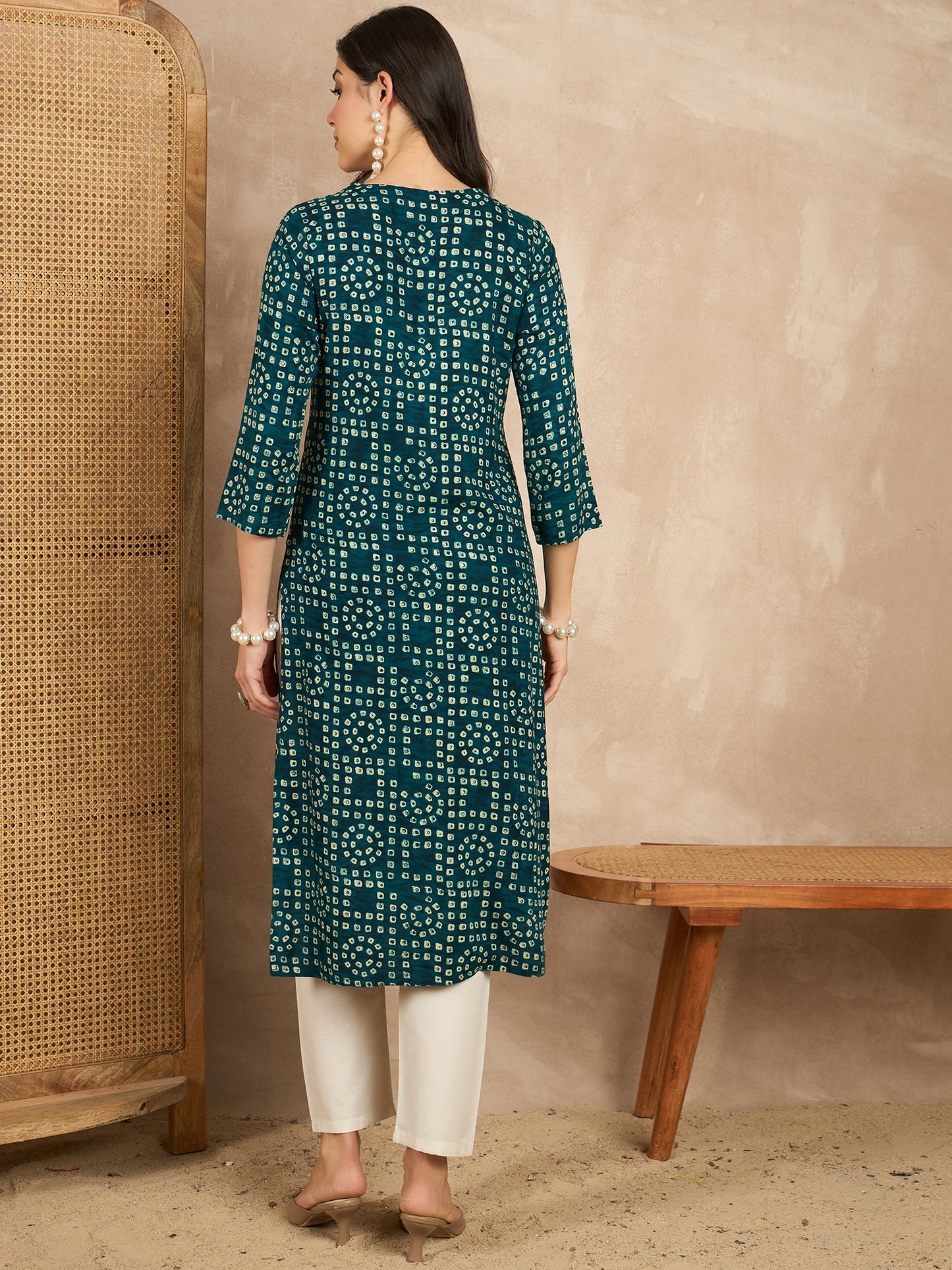 WOMEN VISCOSE RAYON STRAIGHT KURTI EMBLISHED WITH HAND WORK ON V-NECKILINE YOKE